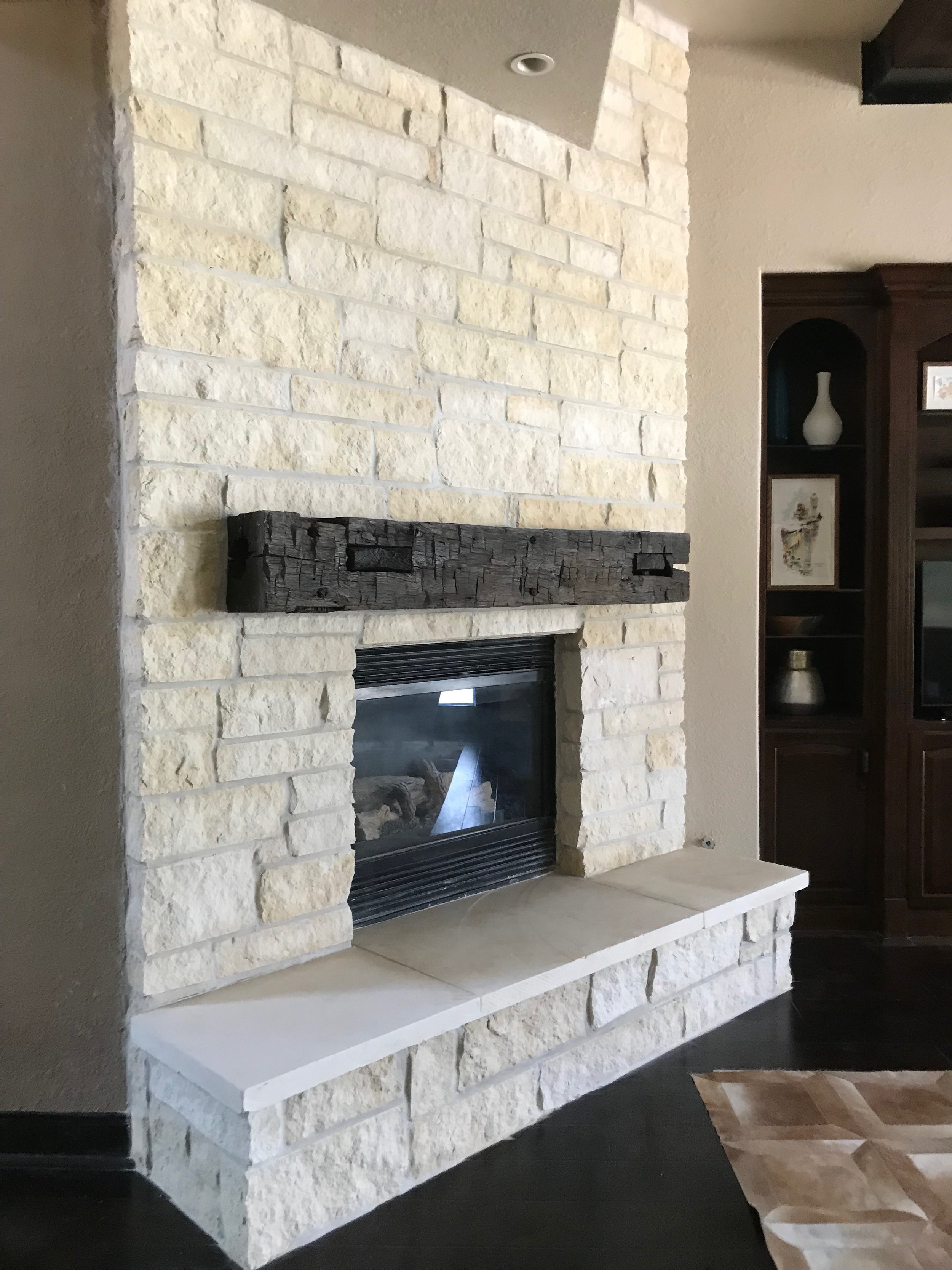 Stone Fireplace, Hearth, &amp; Wood Mantle in Spring, TX - 4” stone (Austin Stone) with new wood mantle and fireplace hearth (Austin Stone) in Glenloch Farms