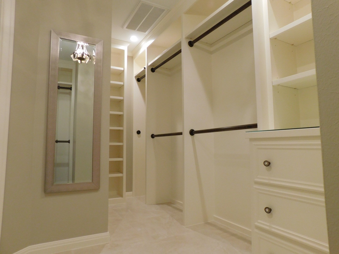 Champions Master Closet - Converted hallway to walk-in closet with his and her wardrobes
