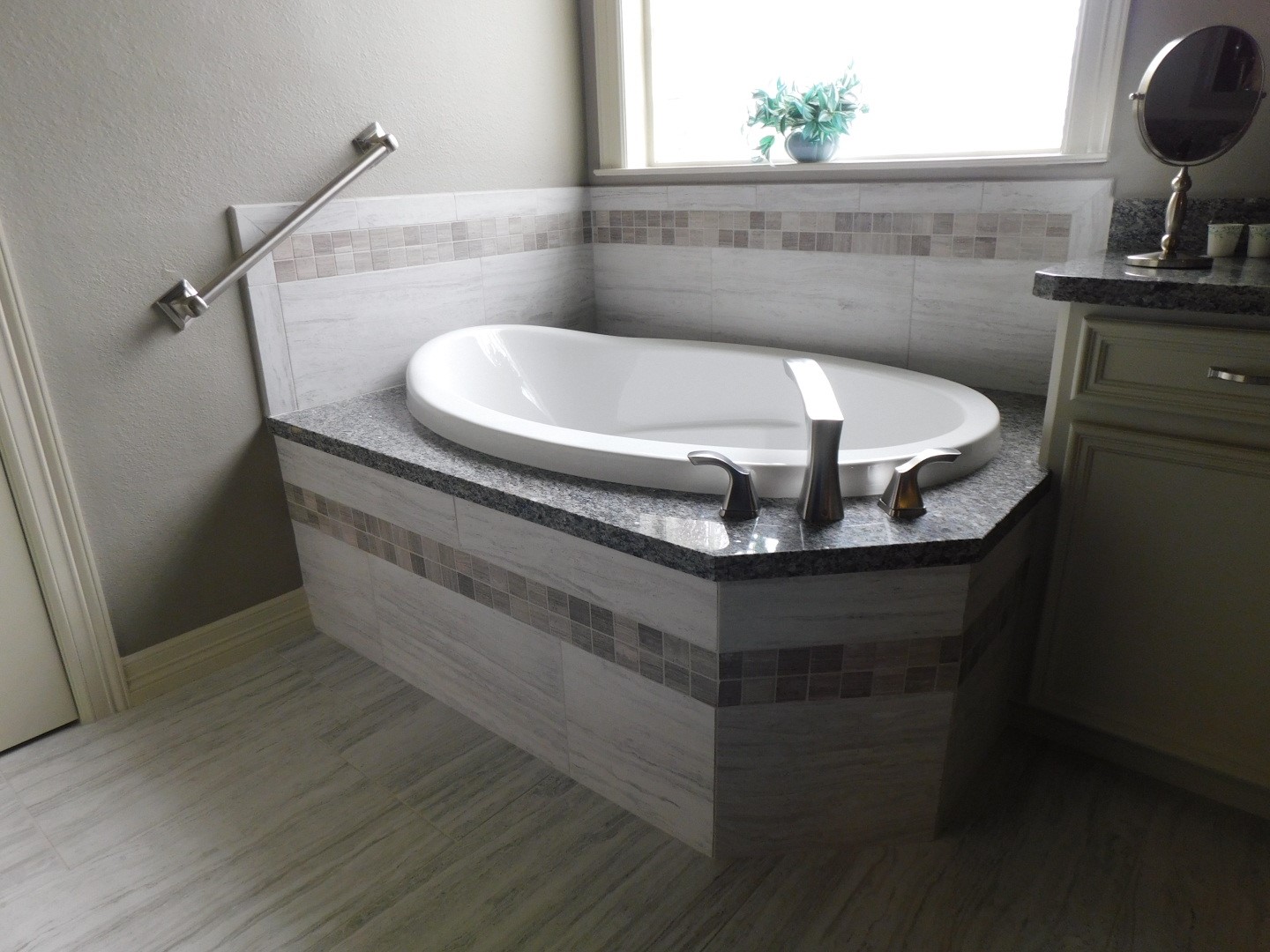 Master Bathroom Renovation Houston - New soaking tub, tub top, back splash, tile floor, tub filler, accessories, paint