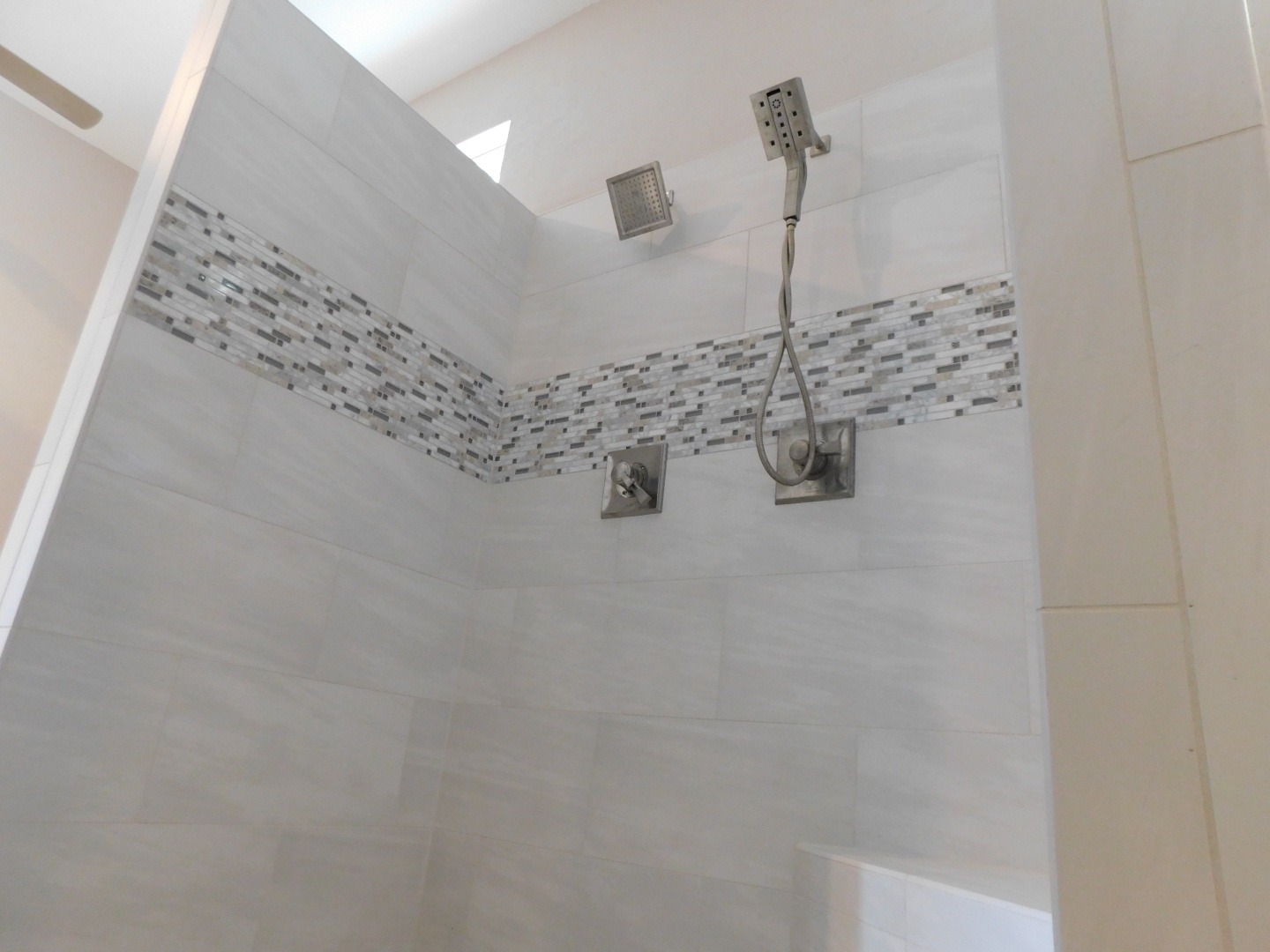 Master Bath Renovation Conroe - Waterproofing system (No leak or mold) and two shower heads with deco line