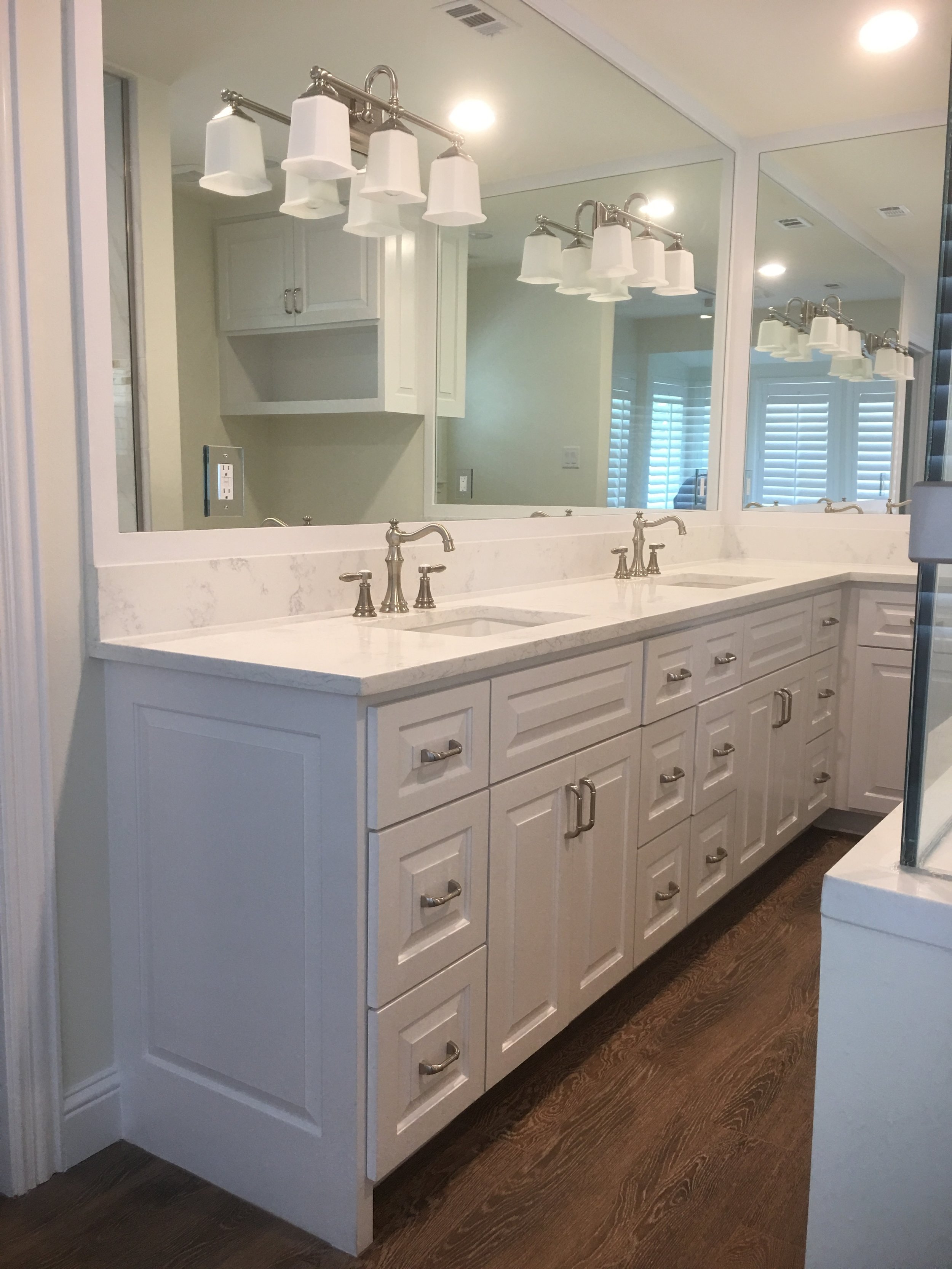 Master Bathroom Renovation Spring - Bathroom remodel with custom cabinet, double sink &amp; faucet, full height mirror with wall sconces. Bathroom redesign, shower remodel with frame less glass. 