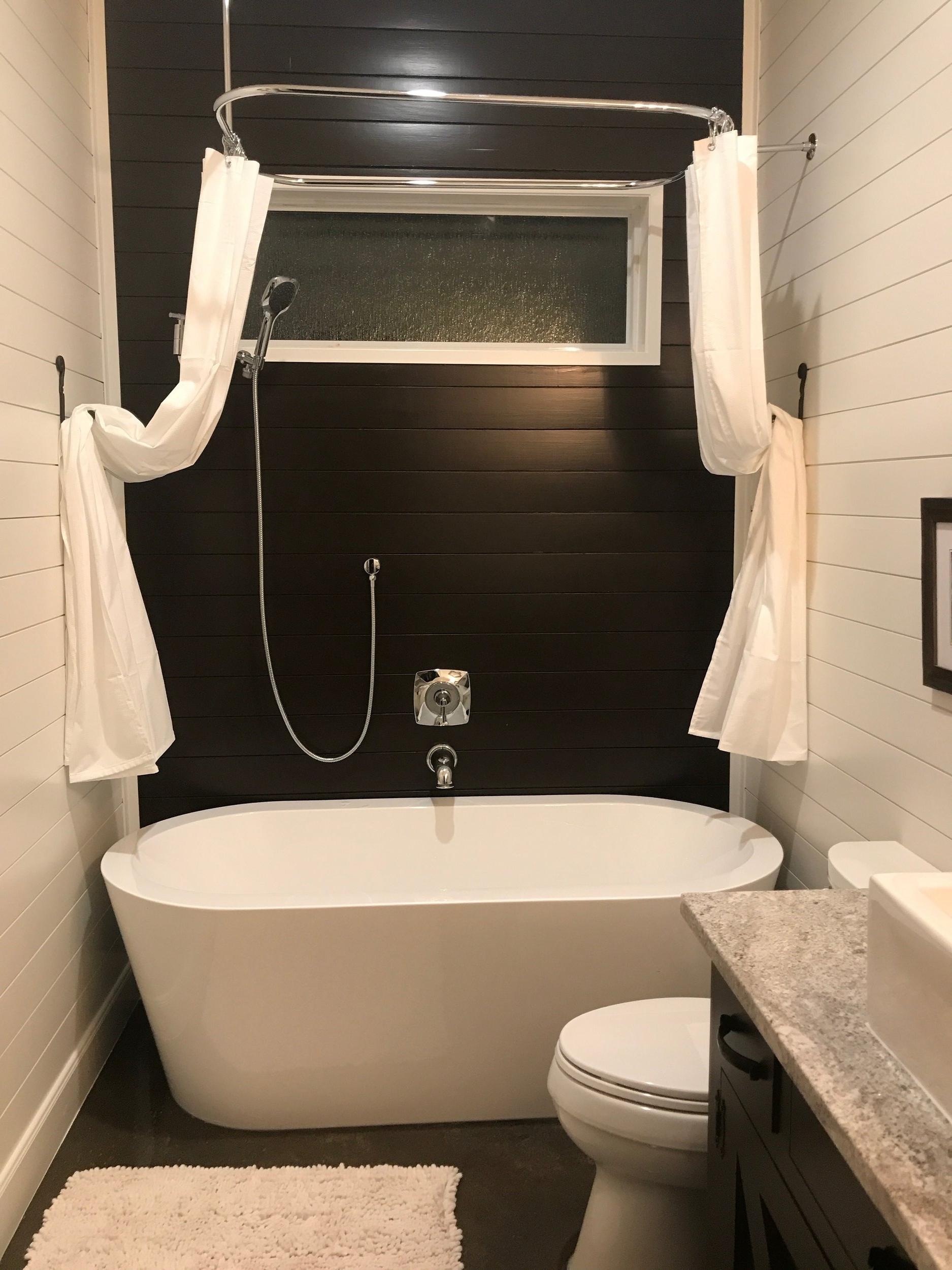 Guest Bathroom Renovation Tomball - Freestanding tub/shower combination with ship lap walls